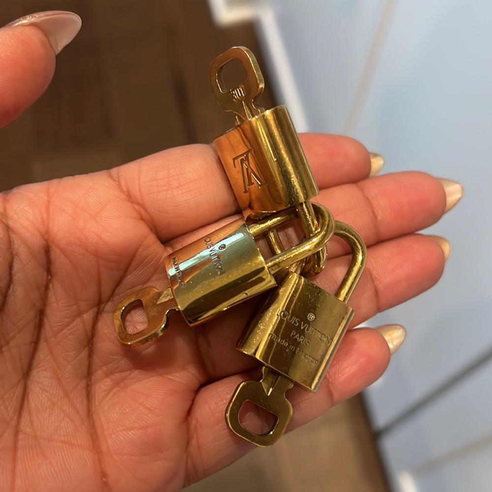 Louis Vuitton Gold Lock and Key pick one 301,303,305